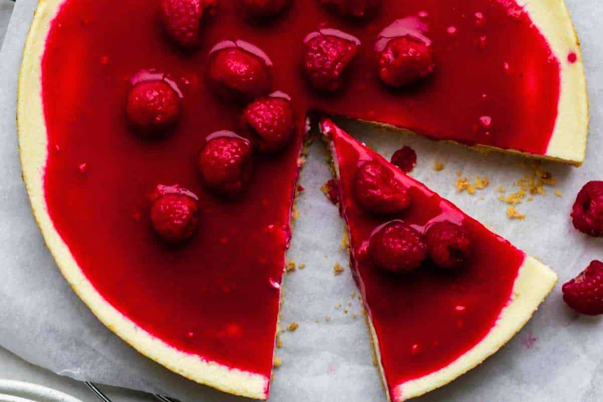 A slice of cheesecake made with cottage cheese, featuring a smooth, creamy texture and a golden crust, presented on a delicate plate, offering a healthier but equally tasty alternative to traditional cheesecake.