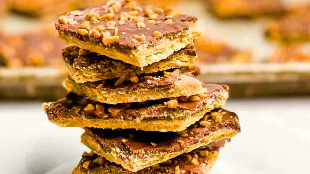 Graham Cracker Toffee with layers of graham crackers, toffee, and chocolate, broken into pieces.