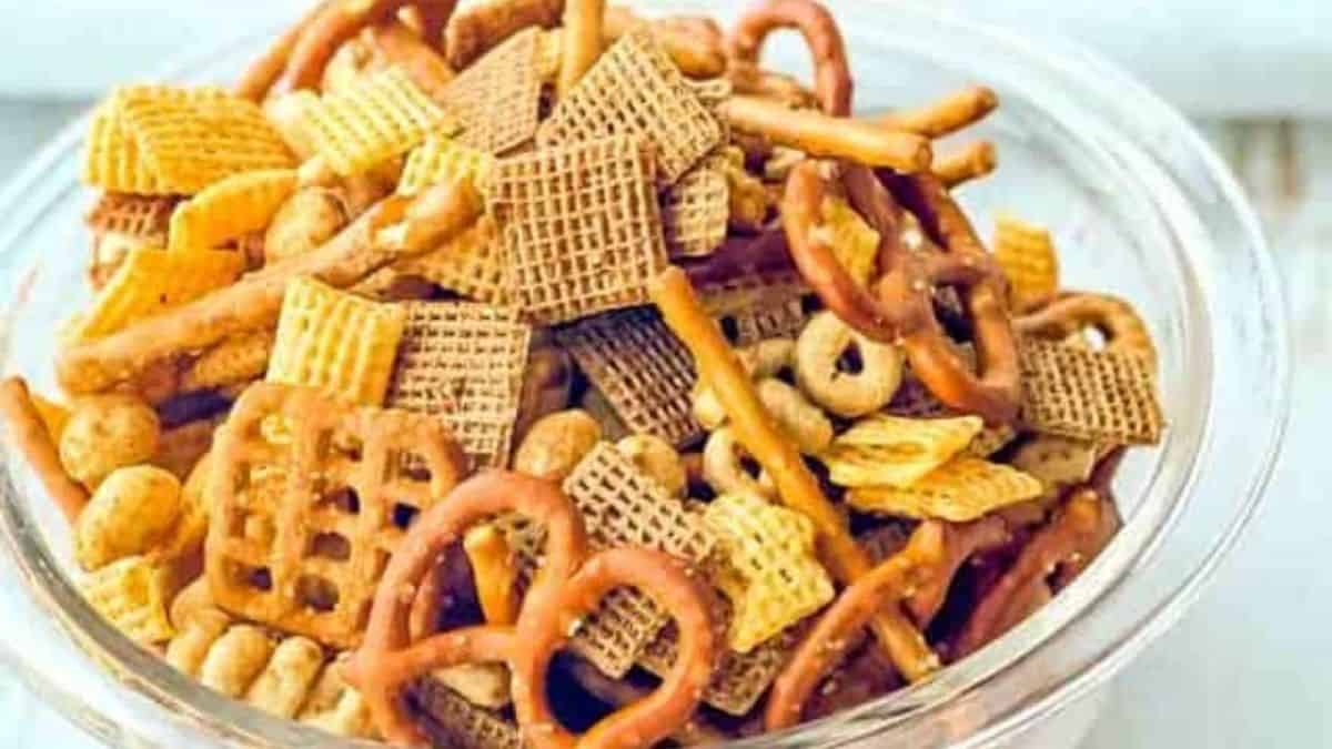 A bowl of perfectly seasoned Chex mix with an irresistible smoky twist.
