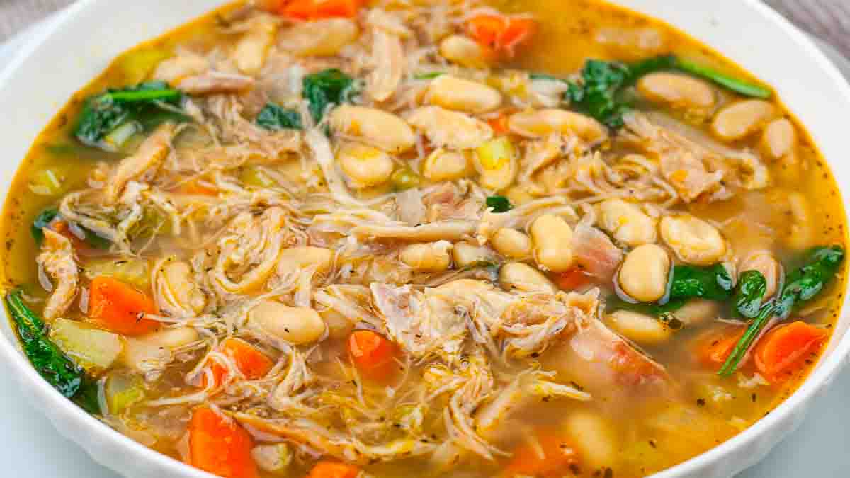 A hearty soup combining smoky turkey with tender white beans and vegetables.