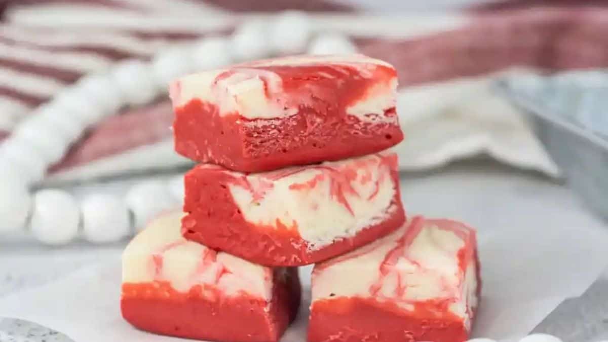 Squares of red fudge marbled with creamy white swirls, creating a striking red velvet effect.