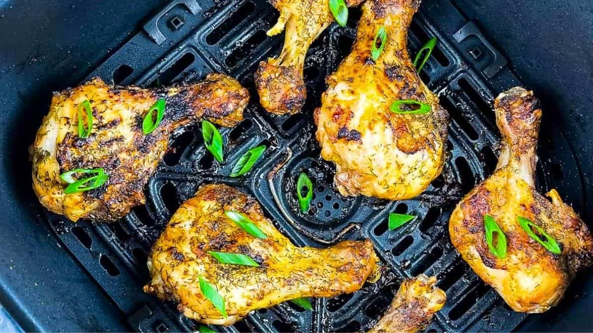Perfectly cooked chicken legs with crispy skin.