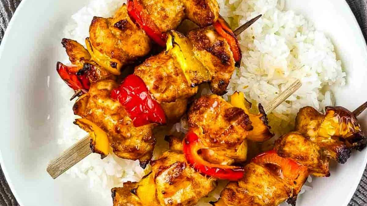 Colorful skewers loaded with juicy chicken and rainbow vegetables.