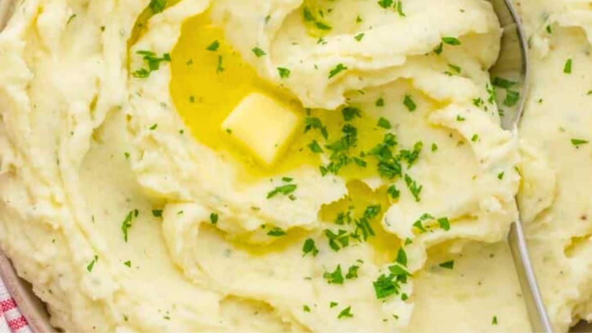 Creamy mashed potatoes elevated with herbed Boursin cheese.