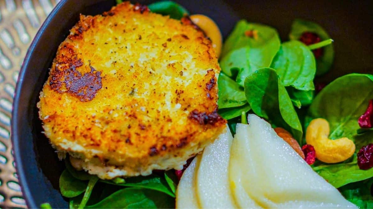 Crispy fried Boursin over fresh greens.