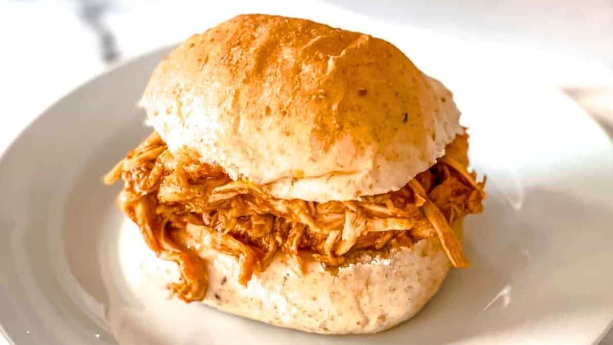 Shredded BBQ chicken on a homemade bun.