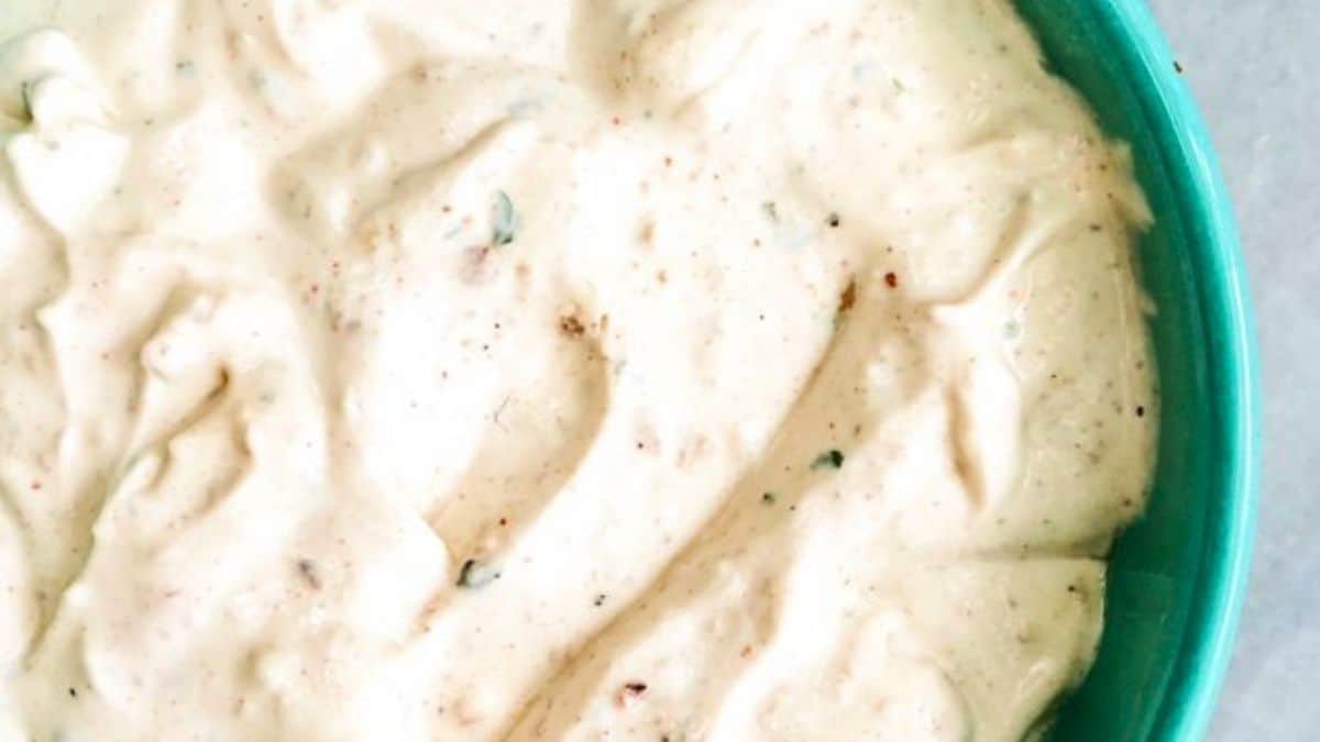 Creamy french onion dip in a serving bowl.