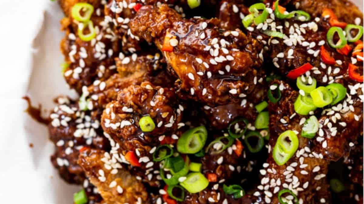 Deep red glazed wings topped with dried chilies and green onions.