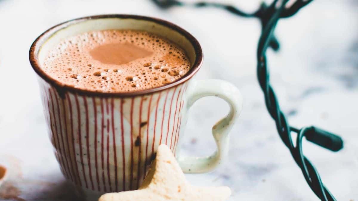 Dark hot chocolate in a rustic ceramic mug.