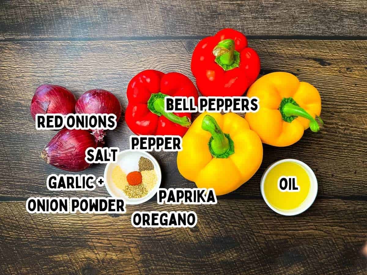 Ingredients for smoked bell peppers and onions, including red onions, red and yellow bell peppers, olive oil, salt, black pepper, garlic powder, onion powder, paprika, and oregano, labeled with bold text on a dark wood background.