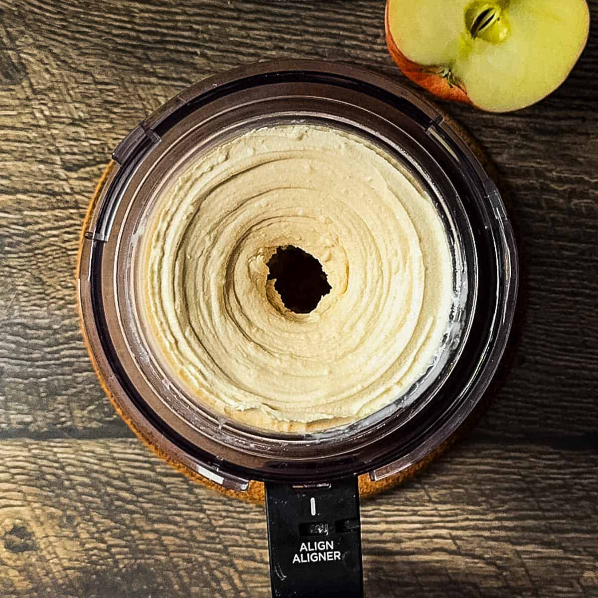 Silky smooth apple pie ice cream in the bowl assembly after the re-spin, showing a silky smooth texture.