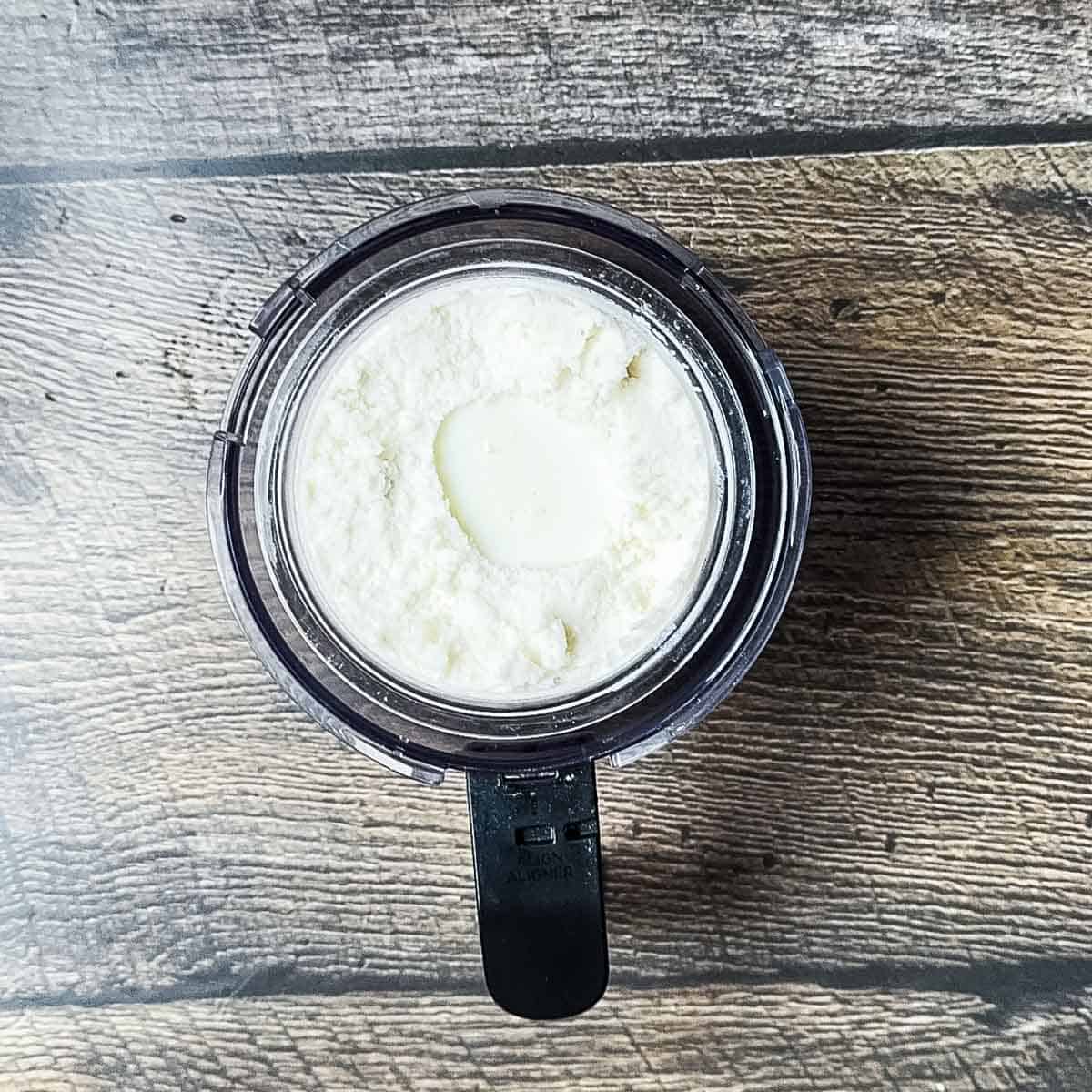 The ice cream base with a tablespoon of milk in the center before the re-spin.