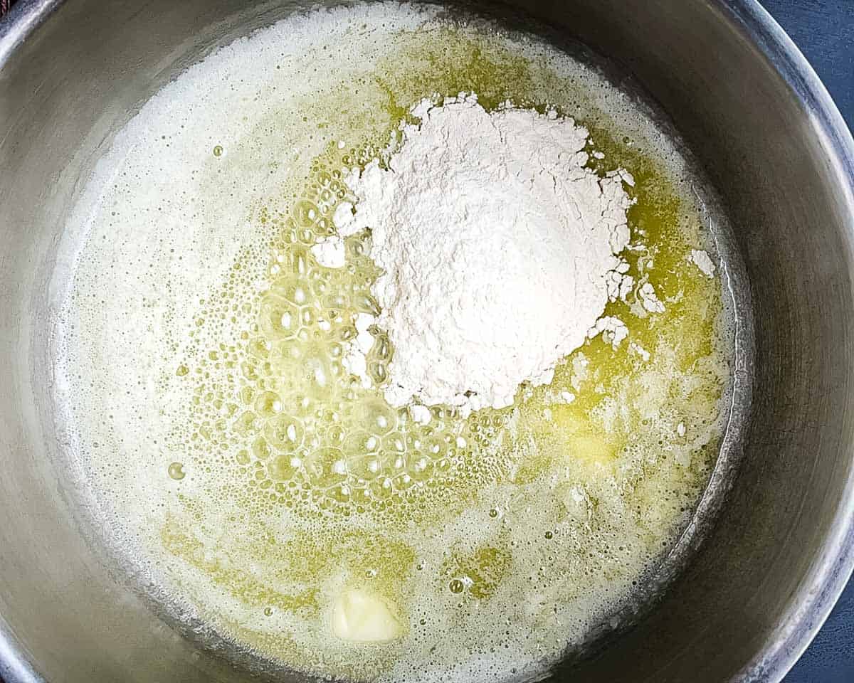 Butter melted with flour in a saucepan to form a smooth roux.