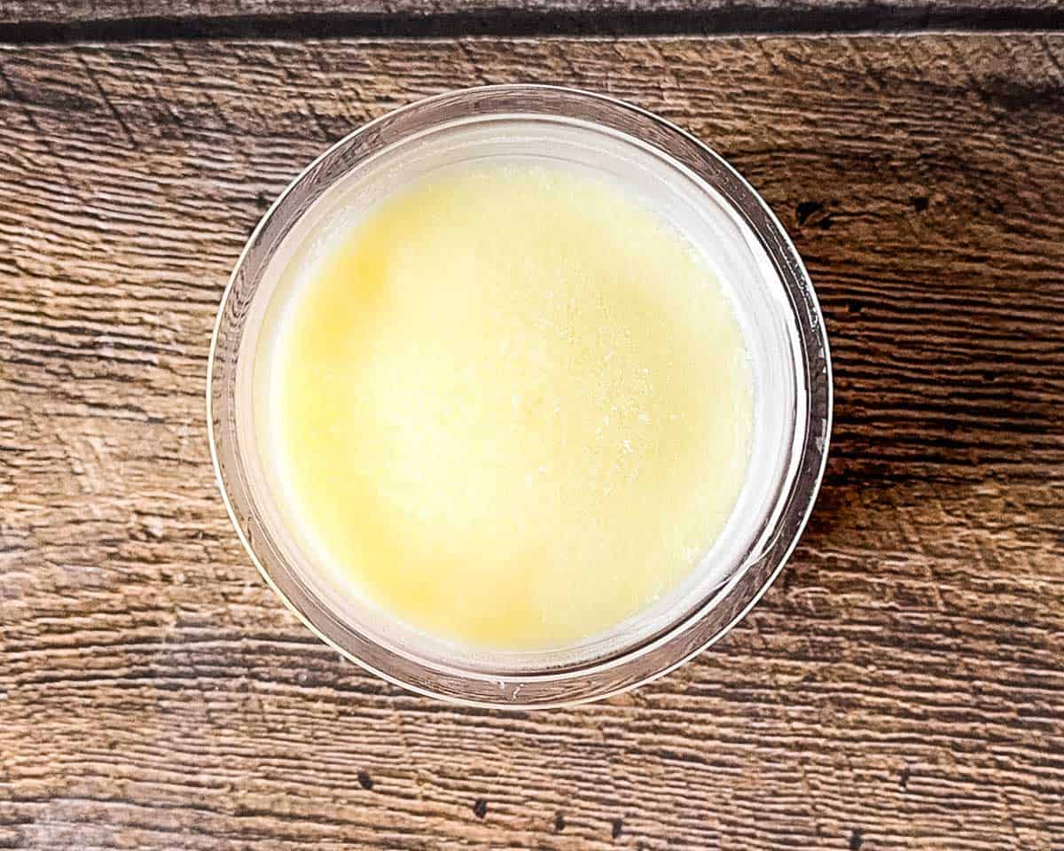 The frozen yogurt mixture in the pint container.