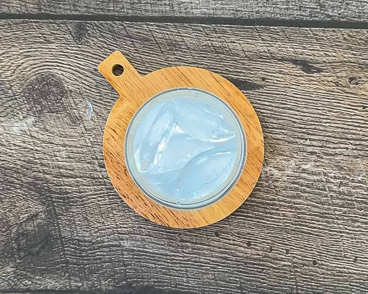 Glass filled with ice for iced chai tea latte.