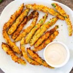 Air fryer green bean fries coated in crispy Parmesan panko breadcrumbs served with creamy dipping sauce.