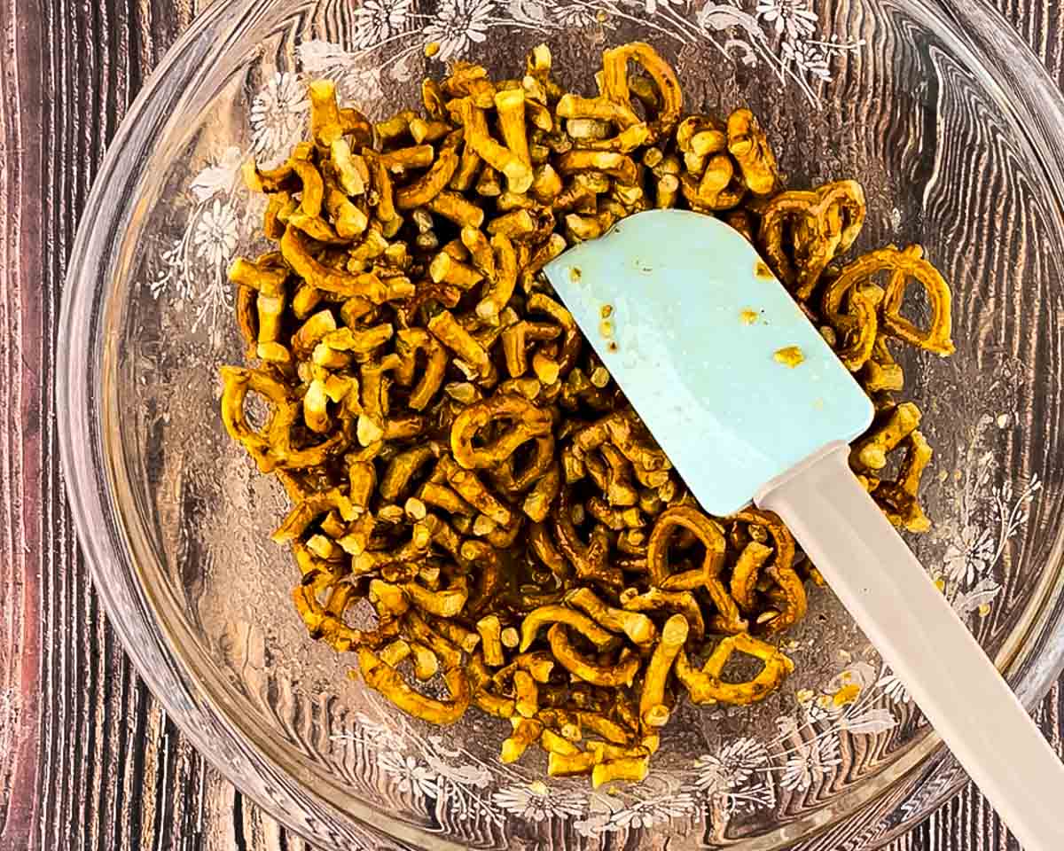 Crushed pretzels mixed with melted butter and sugar for strawberry pretzel salad crust.