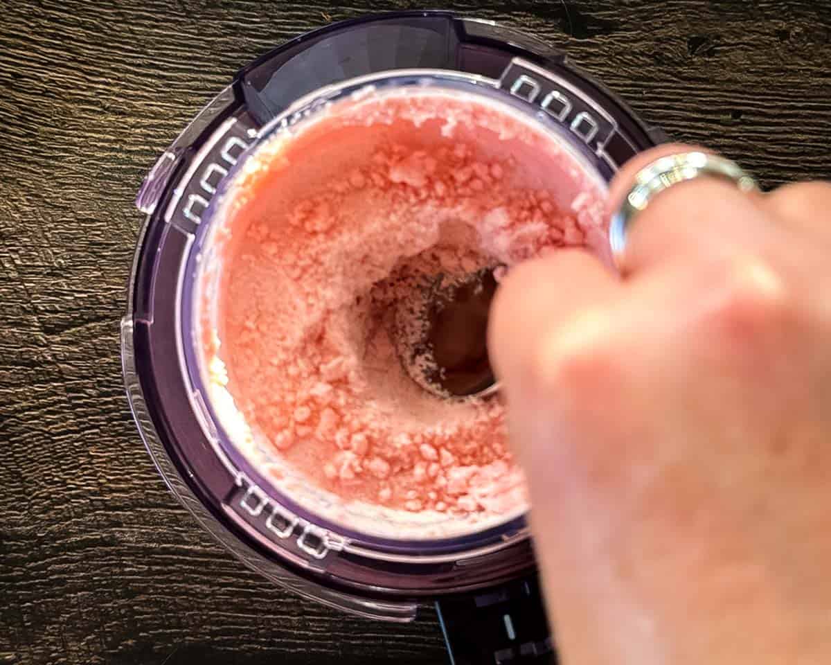 Making a well with a spoon after the first spin.