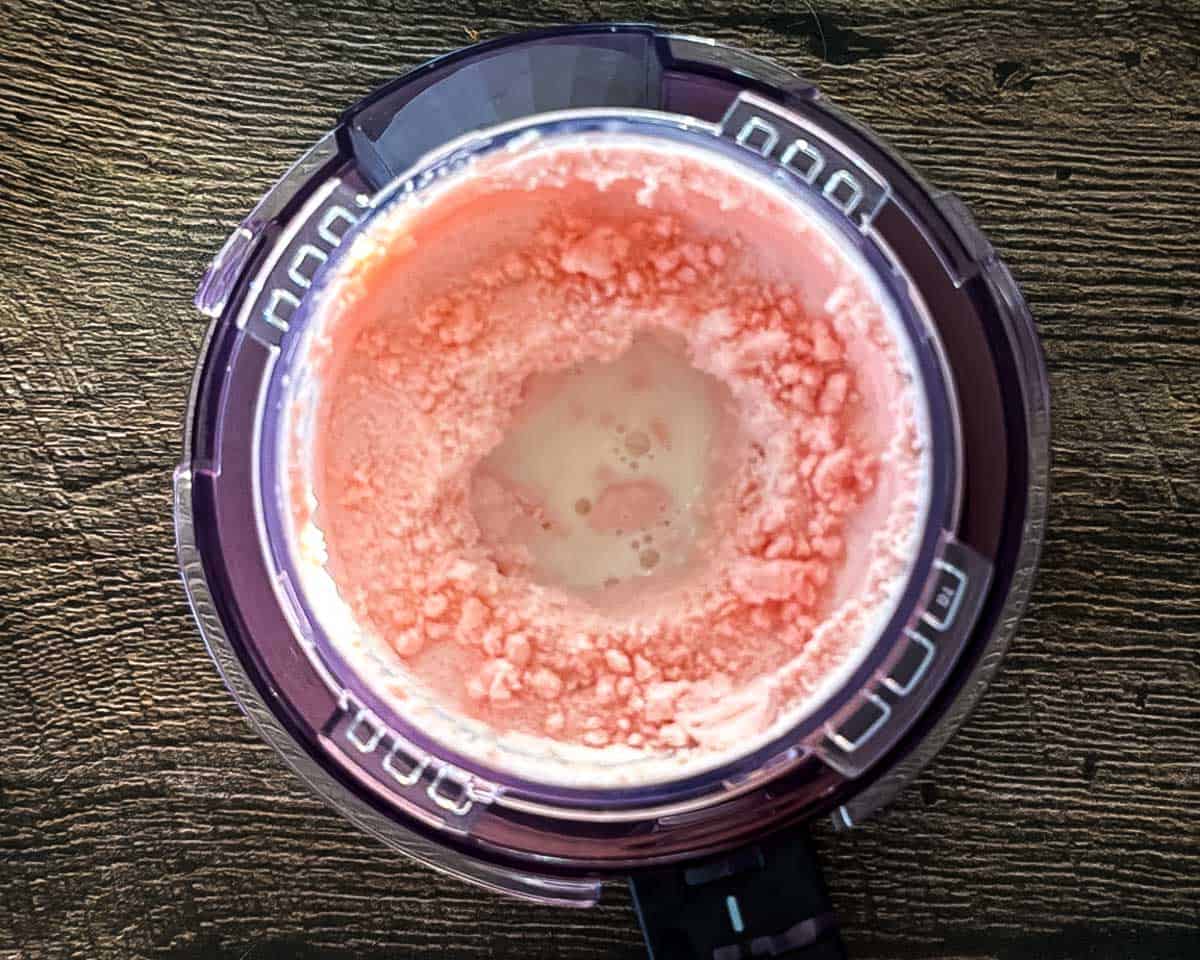 A tablespoon of milk added to the well in the center of the ice cream mixture.