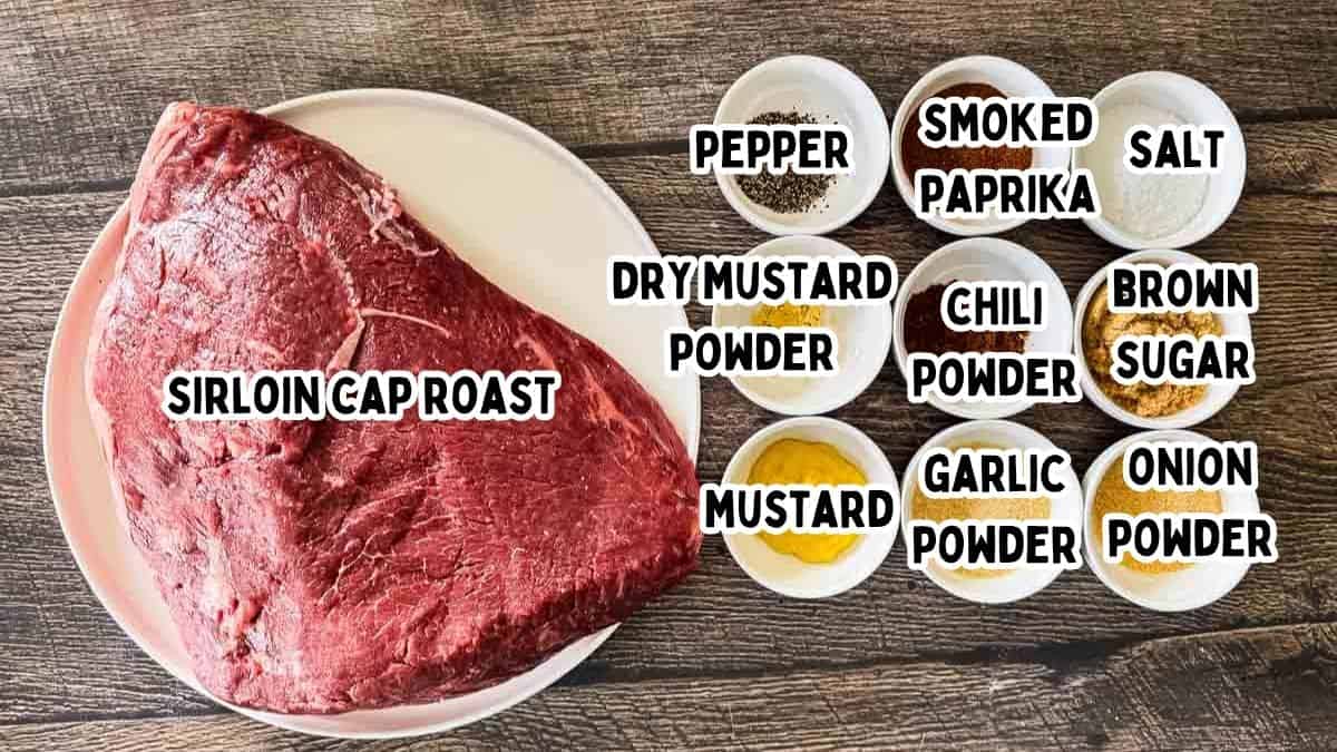 Labeled ingredients for smoked sirloin cap roast including picanha roast, yellow mustard, salt, pepper, garlic powder, and onion powder.
