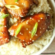 Slow cooker Mongolian chicken on a bed of white rice.