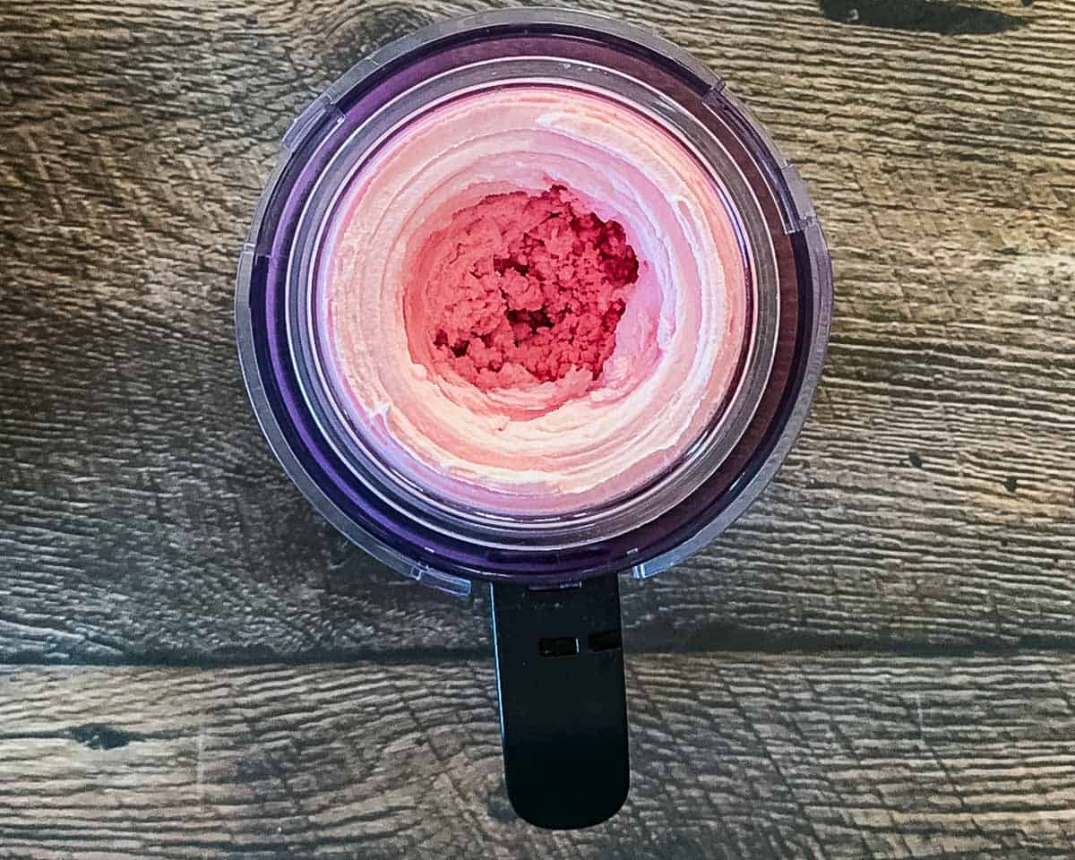 A close-up view of a processed pint container showing the ice cream texture from the top after the re-spin.