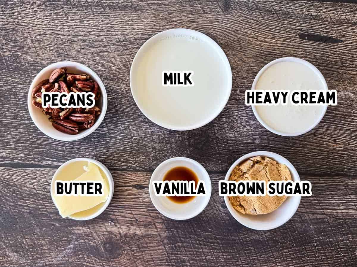 Ingredients for Ninja Creami butter pecan ice cream including pecans, milk, heavy cream, butter, vanilla, and brown sugar.