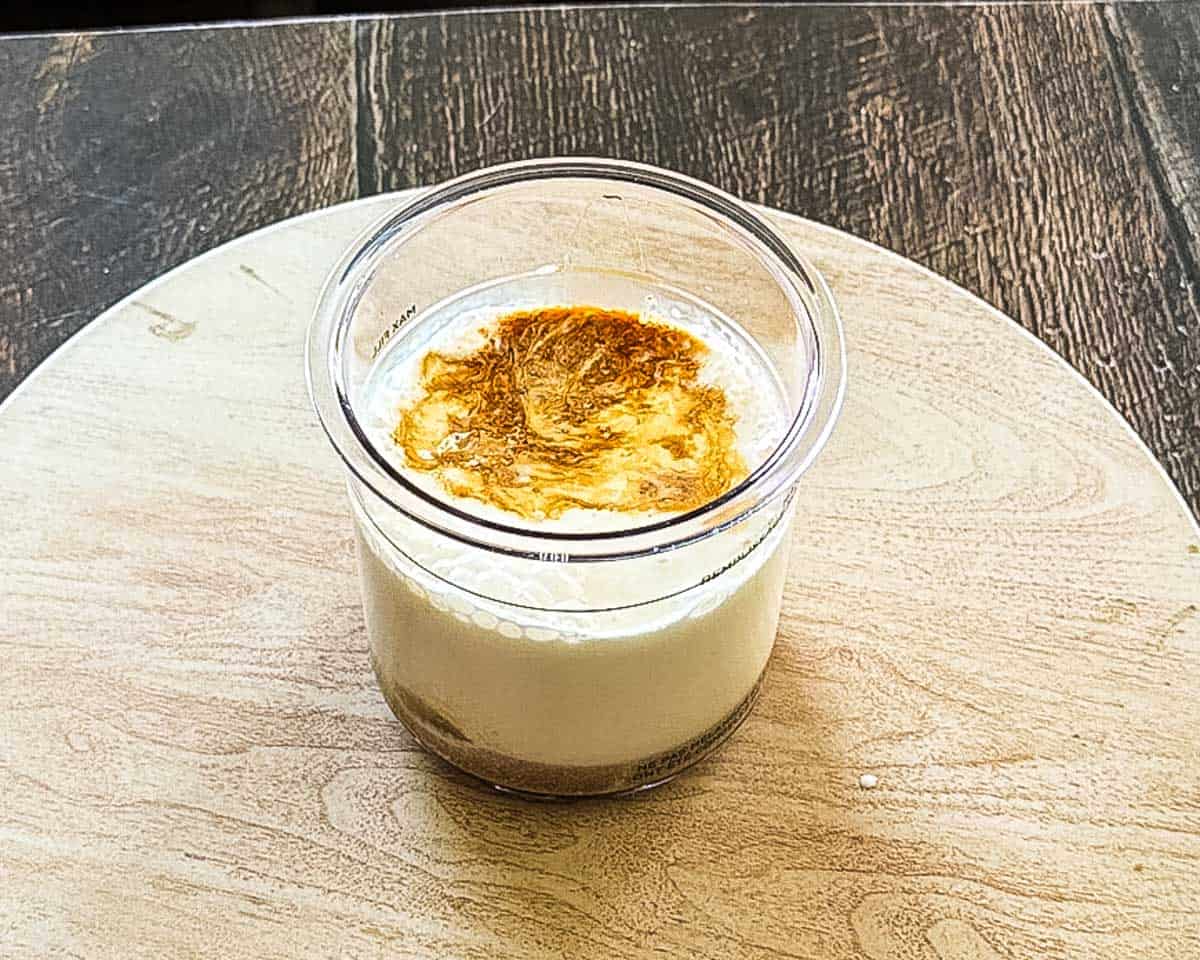 Milk, heavy cream, brown sugar, and vanilla together in a pint container.